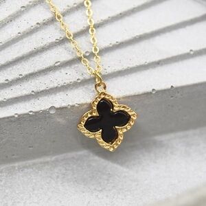 Gold Necklace with Black Clover Pendant